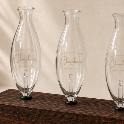 Close detail of the Heritage wood finish, Charabanc glass bulb logo, and bulb seat