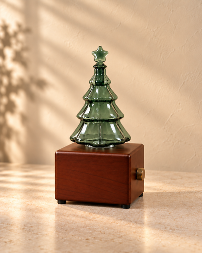 Wood-finish Christmas tree diffuser with unlit translucent green glass and a blank front panel.