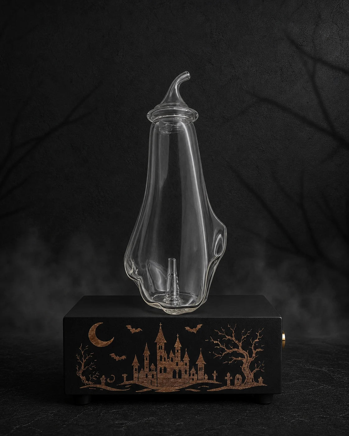 The Haunted Castle copper-engraved black MINI diffuser with blank Ghost glass bottle and fitted glass cap in a charcoal Halloween setting
