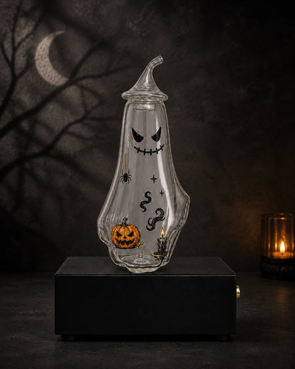 Ghost bottle decorated with pumpkin, candle, smoke, star, and spider stickers and an evenly distributed subtle aromatic mist inside